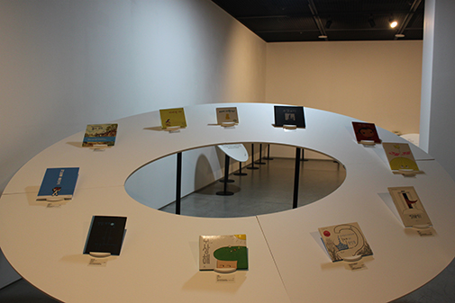 and exhibited books of “Our Stories” (right)