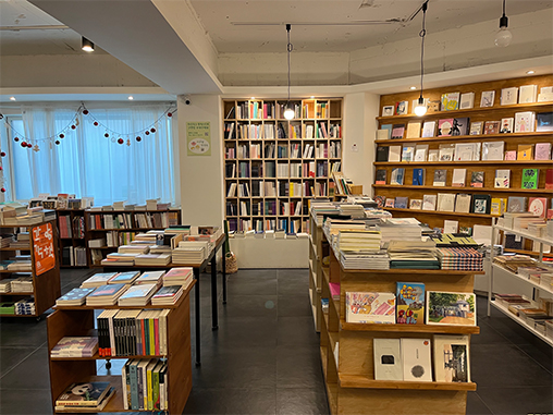Views inside cozy bookstore “Now After Books